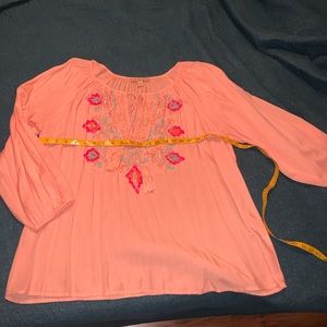 Coral blouse with beaded detail